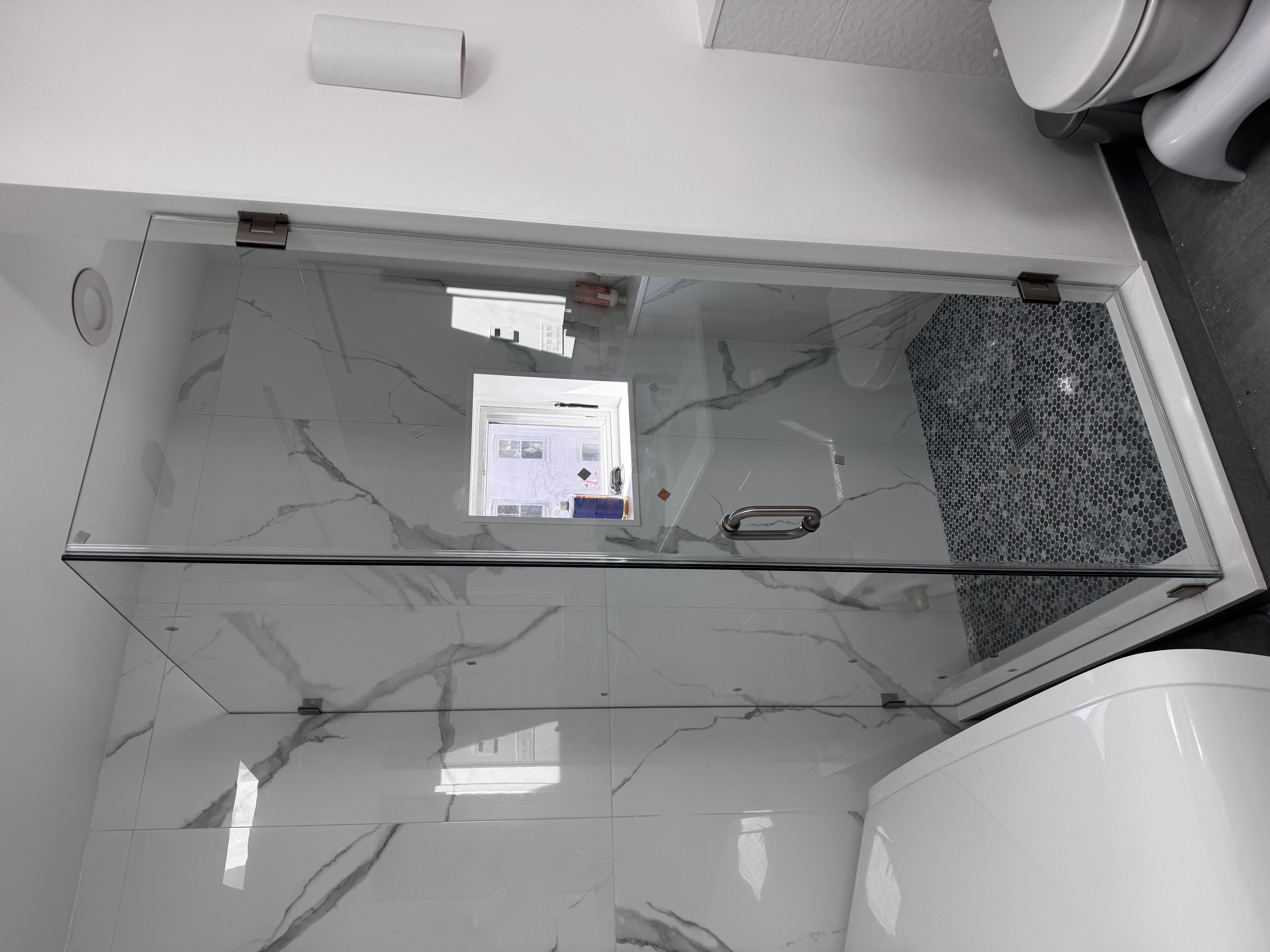 Corner Swing Door shower door installation in Monticello